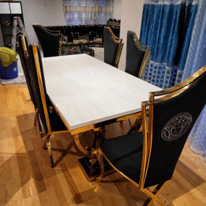 RBM Classic Home Online Furniture Store / Shop With Cheap / Discounted Prices. Luxurious and Stylish Classic Marble Dining table with Gold Versace Classy Black Velvet Dining Room Chairs in Gold Stainless Steel Frame.