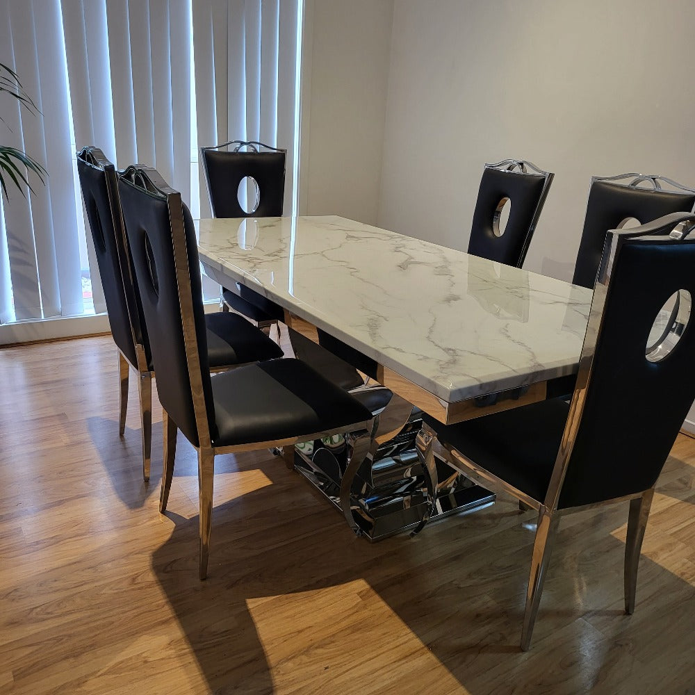 RBM Classic Home Online Furniture Store / Shop With Cheap / Discounted Prices. Luxurious and Stylish U-Shaped Marble Dining table with Gold GG Classy Black Velvet Dining Room Chairs in Silver Stainless Steel Frame.