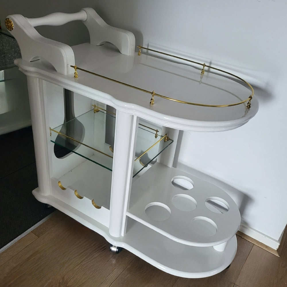 White MDF Kitchen Bar Serving Wine cart - an Epitome of Luxury and Style that Seamlessly Combines Functionality and Aesthetics.