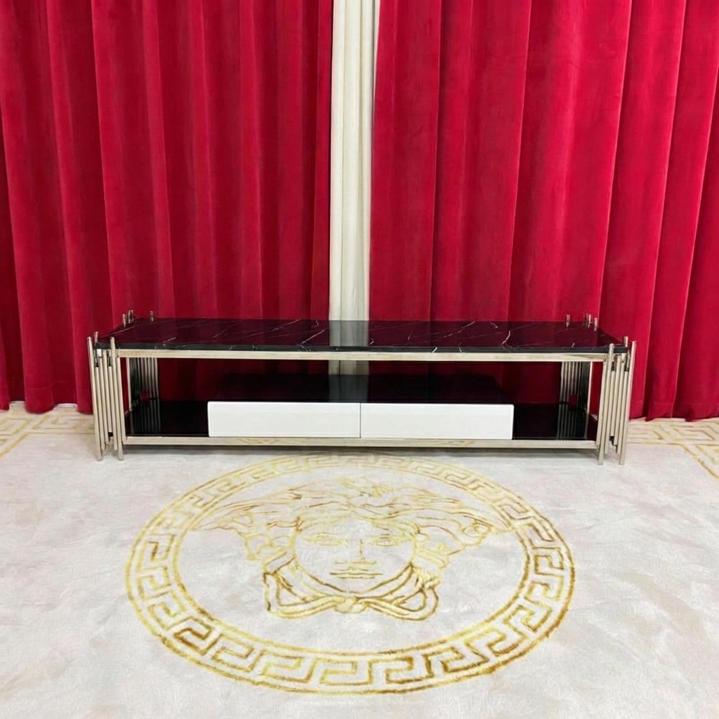 Modern TV stand with a gold Medusa head design on a red curtain background