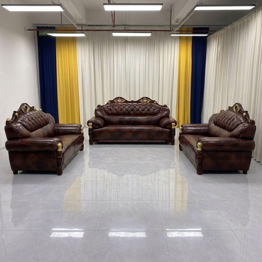 Brown leather sofa set in a showroom with yellow and blue curtains.