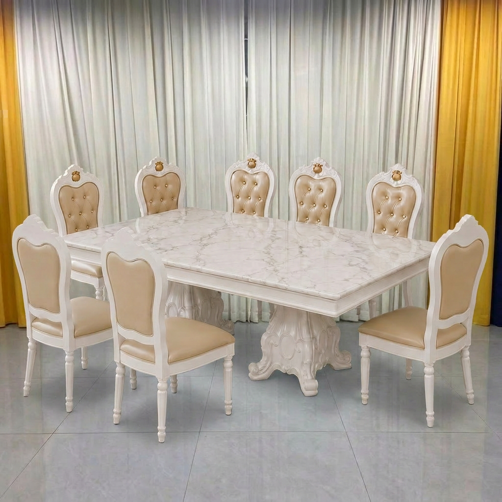 An 8-piece dining set featuring a rectangular white marble-patterned table and six matching high-back chairs with cream tufted upholstery and ornate white frames, set against a backdrop of white and yellow curtains.