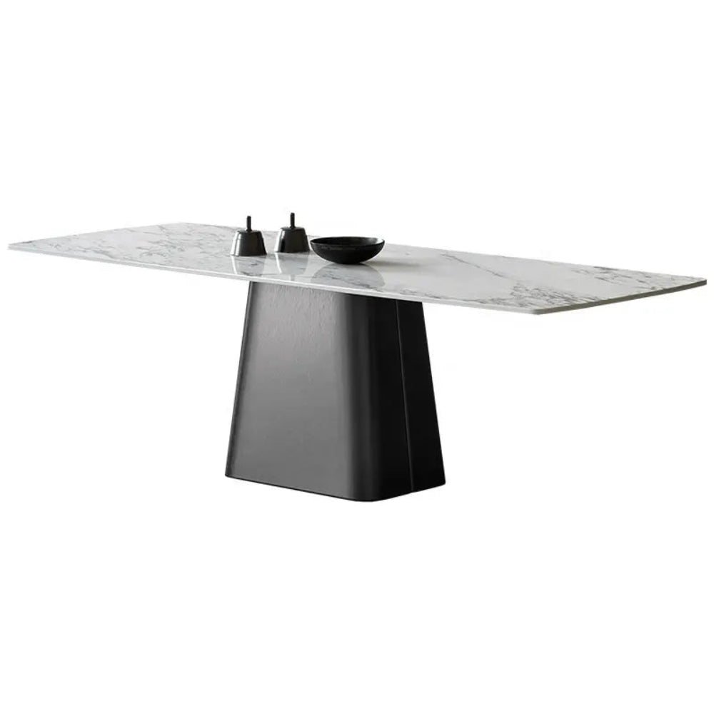 A modern rectangular marble dining table with a dark stainless steel base, accompanied by six chairs not shown in the image.