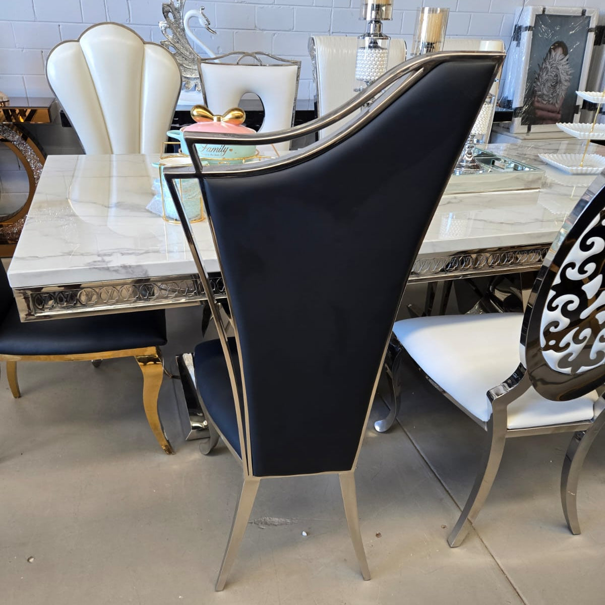 Dining room with a black chair and marble table