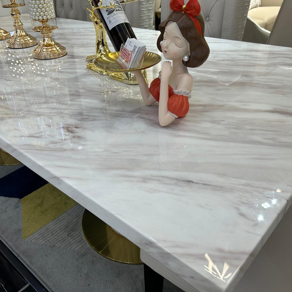 Luxurious and Stylish Elegant Marble Dining table with Silver Modern Black Leather Dining Room Chairs in Gold Stainless Steel Frame