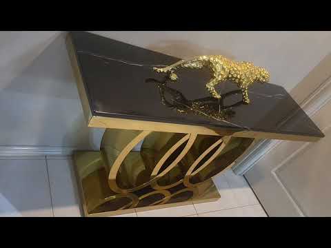 Audi Stylish And Luxurious Black Marble Console Table Featuring A Durable Gold Stainless Steel Frame