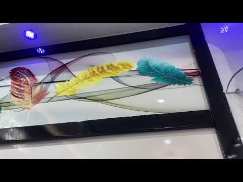 White TV Cabinet with Blue Downlights and speakers. RBM Classic Home