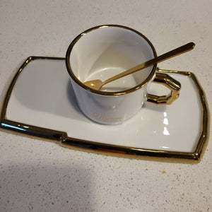 Golden Trim Modern Style Tea Cup, a Saucer and Gold Spoon in White