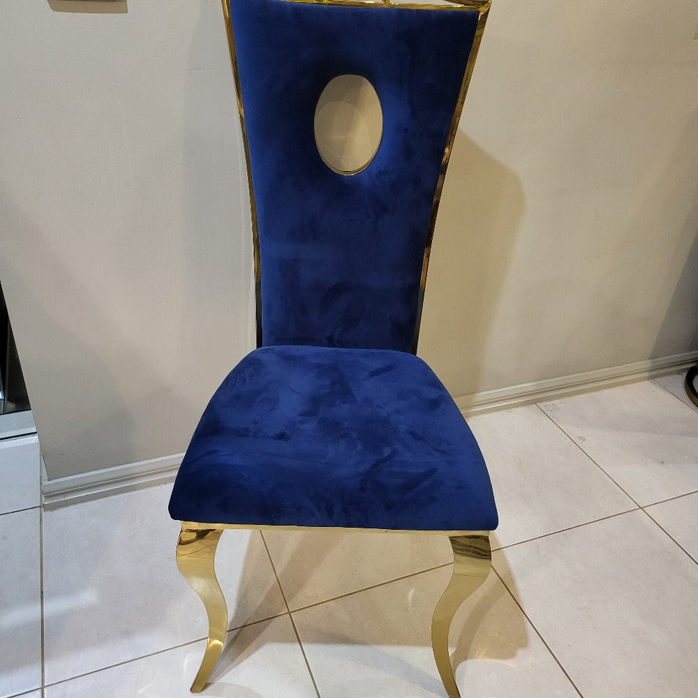 Classy Marble Dining Table With Circle Blue Velvet Style Dining Room Chairs in Silver Stainless Steel Frame