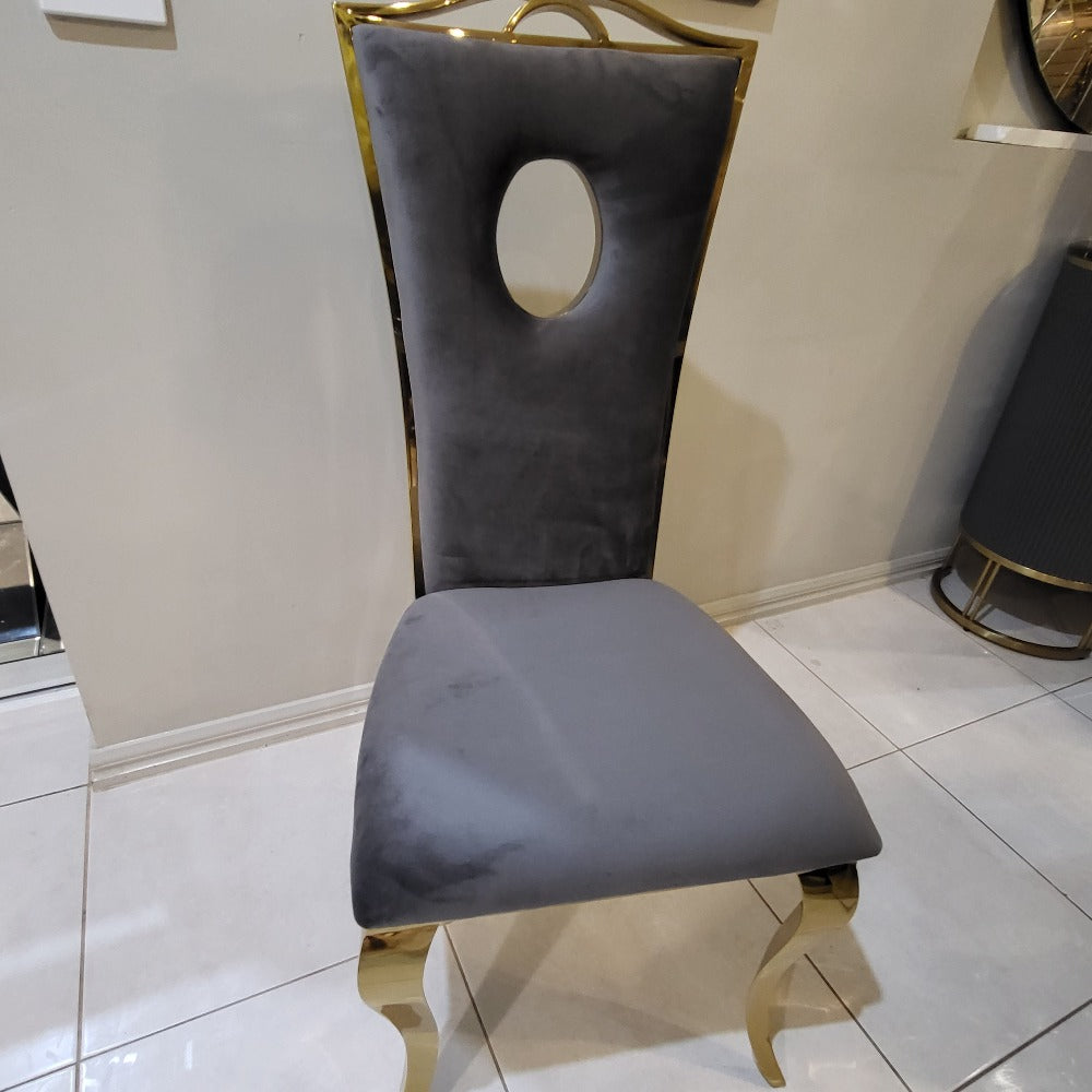 Luxurious and Stylish Elegant Marble Dining table with Circle Grey Velvet Dining Room Chairs in Stainless Steel Frame