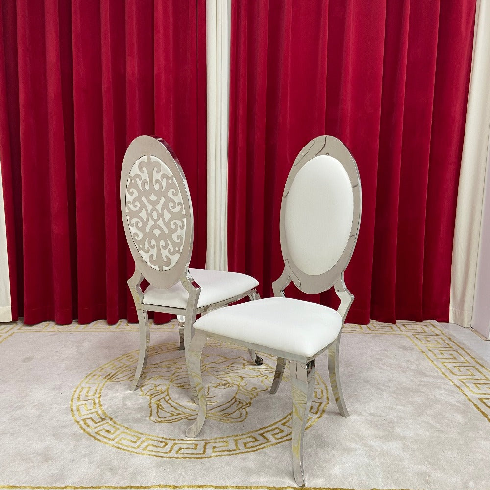 Elegant Marble Dining table with 6 Black Leather Avril Dining Room Chairs in Stainless Steel Frame