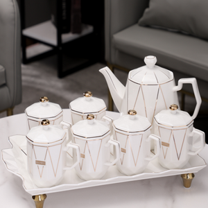 Modern Stylish Ceramic Tea Pot, Tea Cup and Serving Tray in White with Golden Trims