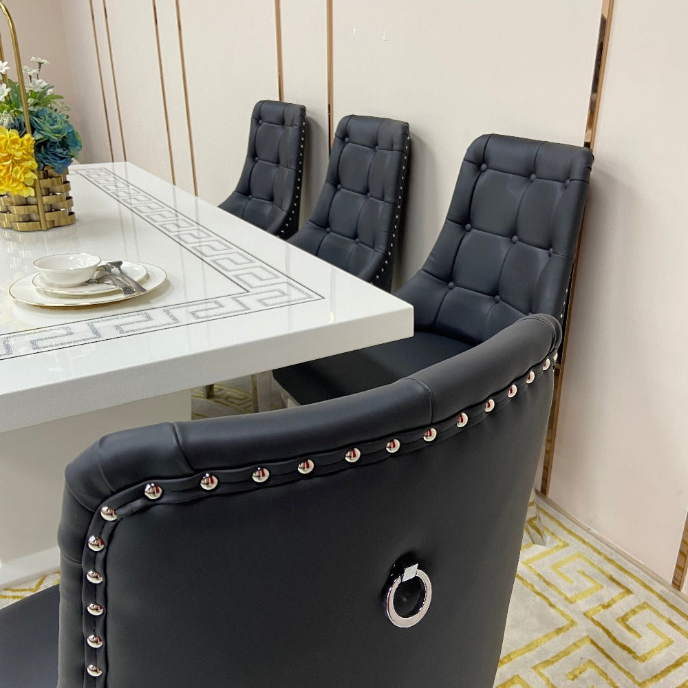 Classy Marble Dining Table With Black Leather Dining Room Chairs in Silver Stainless Steel Frame