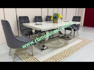 Classic Marble Dining Table With Grey Velvet Dining Room Chairs in Silver Stainless Steel Frame
