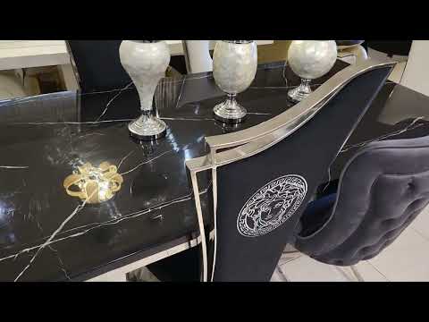 Classic Marble Dining Table With Black Leather Dining Room Chairs in Gold and Silver Stainless Steel Frame