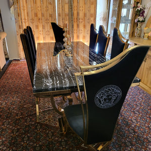 RBM Classic Home Online Furniture Store / Shop With Cheap / Discounted Prices. Luxurious and Stylish Elegant Marble Dining table with Gold Classy Black Velvet Dining Room Chairs in Gold Stainless Steel Frame.