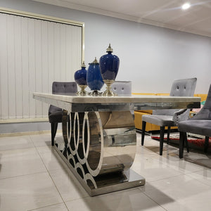 RBM Classic Home Online Furniture Store / Shop With Cheap / Discounted Prices. Luxurious and Stylish Elegant Marble Dining table with Silver Modern Black Velvet Dining Room Chairs in Stainless Steel Frame.