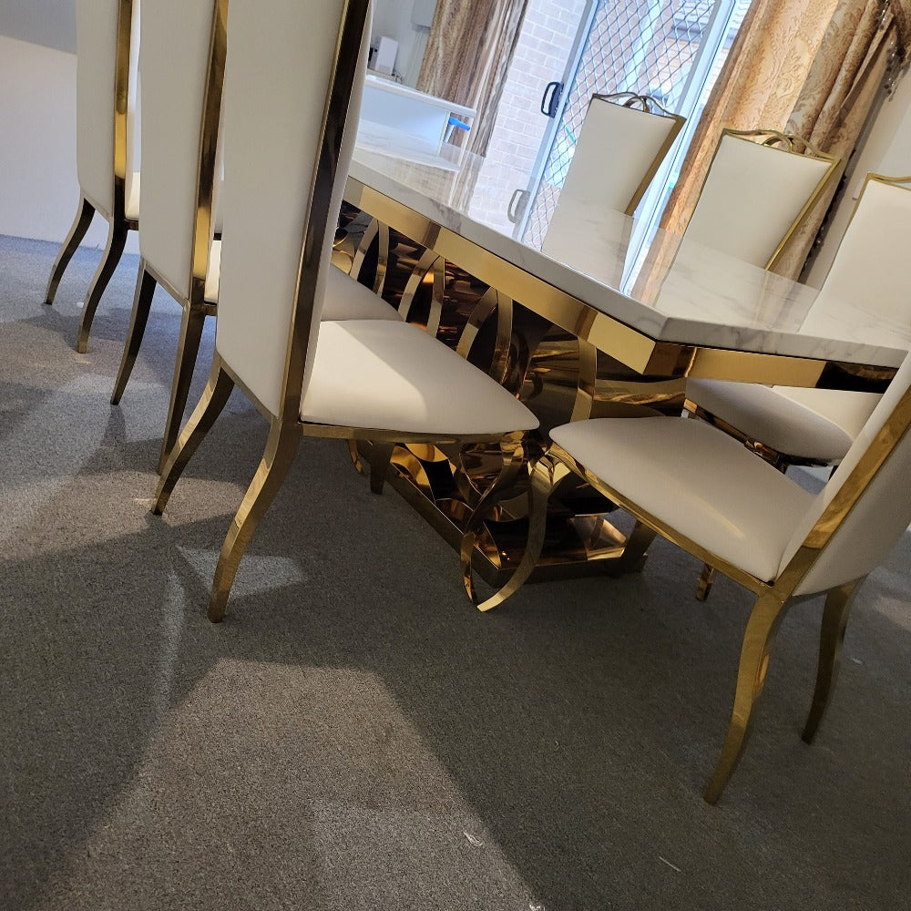 RBM Classic Home Online Furniture Store / Shop With Cheap / Discounted Prices. Luxurious and Stylish Elegant Marble Dining table with Gold Modern Black Velvet Dining Room Chairs in Gold Stainless Steel Frame.