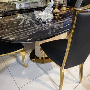 Oval Shaped Classy Luxurious and Stylish Marble Dining table with Gold Modern Black Velvet Dining Room Chairs in Gold Stainless Steel Frame