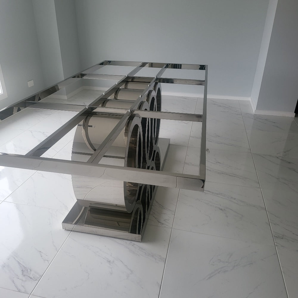 Luxurious and Stylish Elegant Marble Dining table with Silver Modern Black Velvet Dining Room Chairs in Silver Stainless Steel Frame.