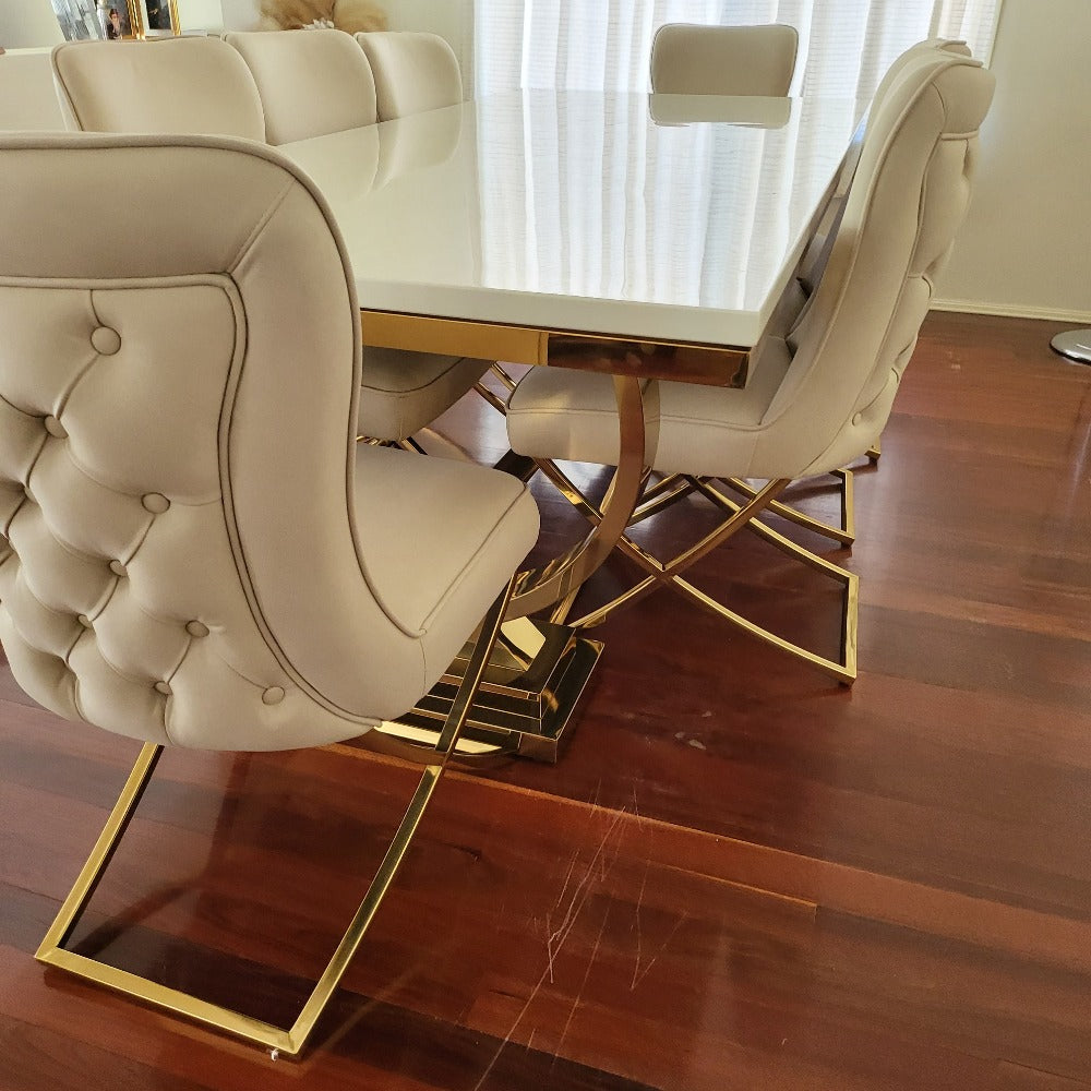 RBM Classic Home Online Exclusive Quality Furniture Store / Shop With Cheap / Discounted Prices. Luxurious and Stylish Elegant Marble Dining table with Gold GG Style Classy Black Velvet Dining Room Chairs in Gold Stainless Steel Frame.