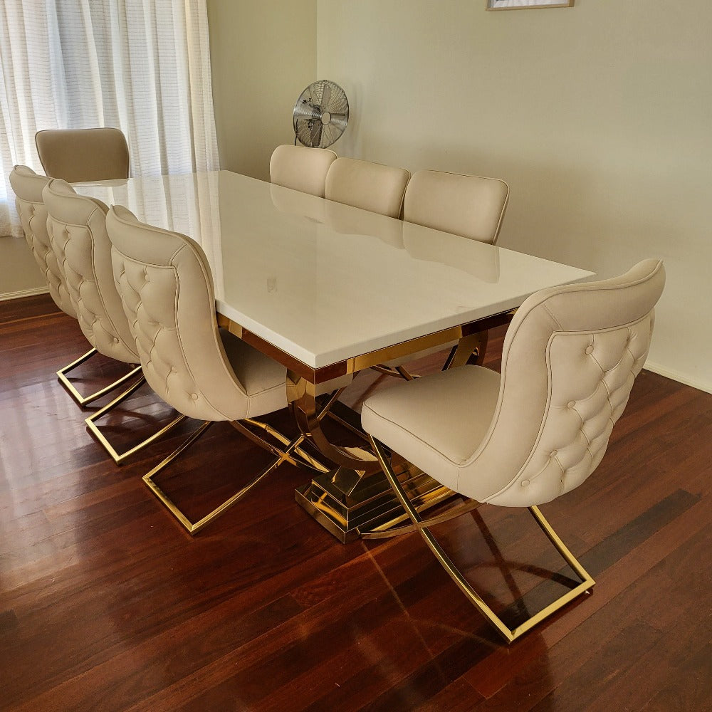 RBM Classic Home Online Furniture Store / Shop With Cheap / Discounted Prices. Luxurious and Stylish Elegant Marble Dining table with Gold Ashton Style Classy Black Velvet Dining Room Chairs in Gold Stainless Steel Frame.