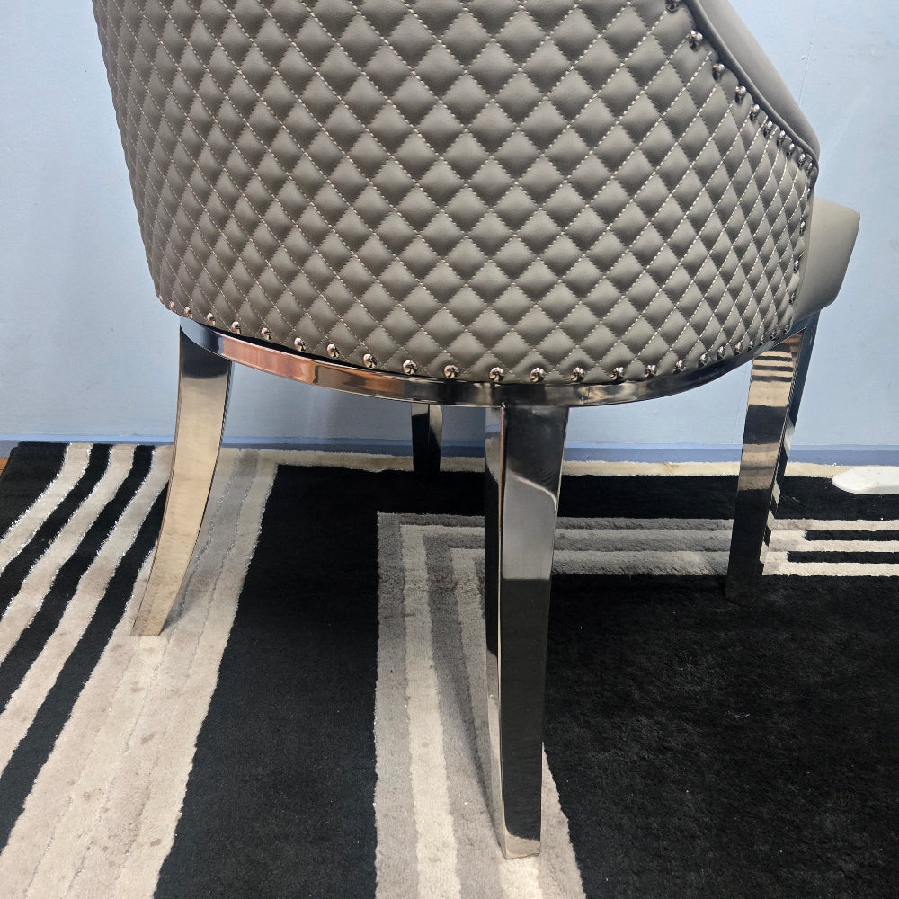 Classy and Modern Classy Grey Leather Cushioned and Comfortable Dining Room Chairs in Silver Stainless Steel Frame. RBM Classic Home Furniture Store in Melton