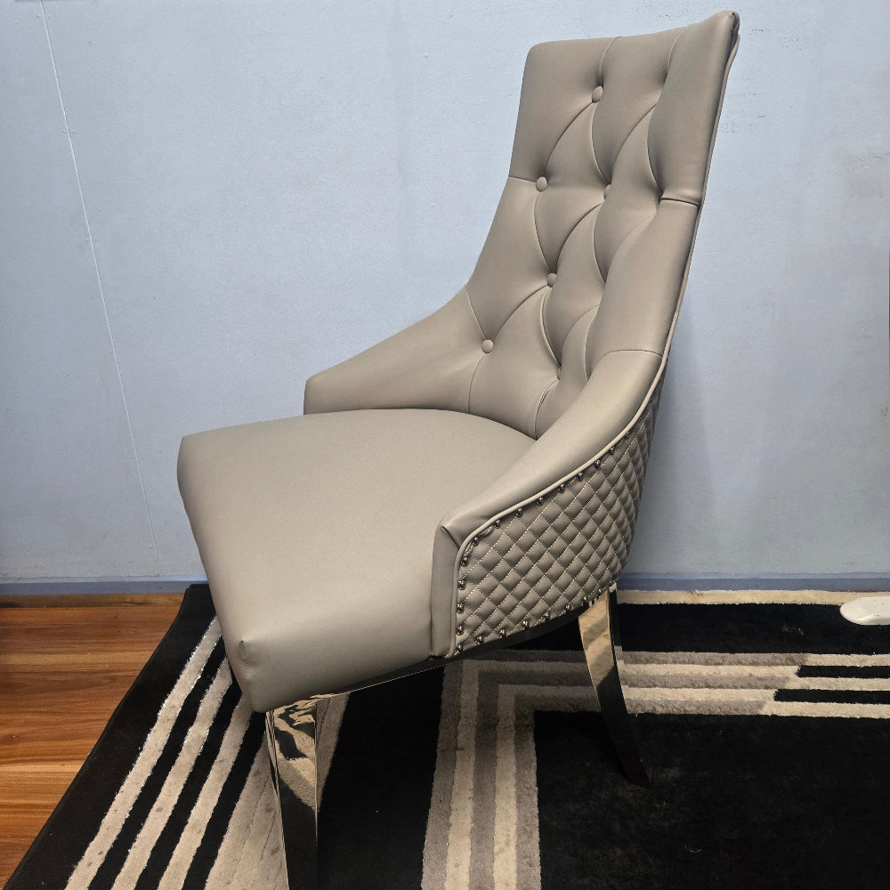 Classy and Modern Classy Grey Leather Cushioned and Comfortable Dining Room Chairs in Silver Stainless Steel Frame. RBM Classic Home Furniture Store in Melton Area