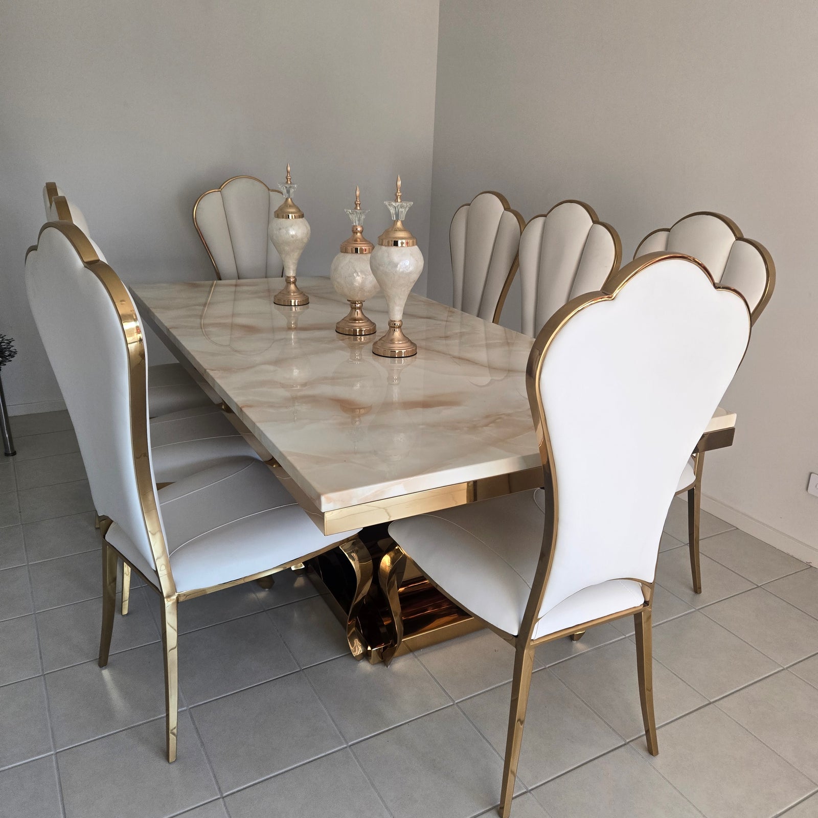 Modern dining table with chairs in a room setting