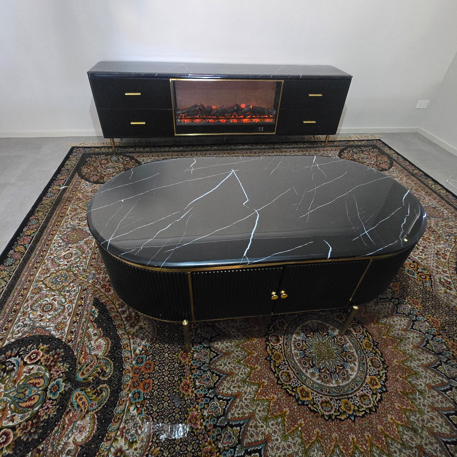 Classy Modern Black MDF Material with Bronze Stainless Steel Frame and Black White Marble TV Cabinet with a Fireplace Reflector and a Remote. RBM Classic Home Furniture Store