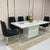 Classy Marble Dining Table With Modern Black Velvet Dining Room Chairs in Silver Stainless Steel Frame