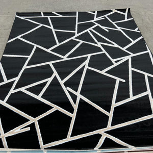 Comfortable Rugs Handmade in Turkey in Black and White Colours. Discover Luxury and Stylish Designs at Affordable Prices.