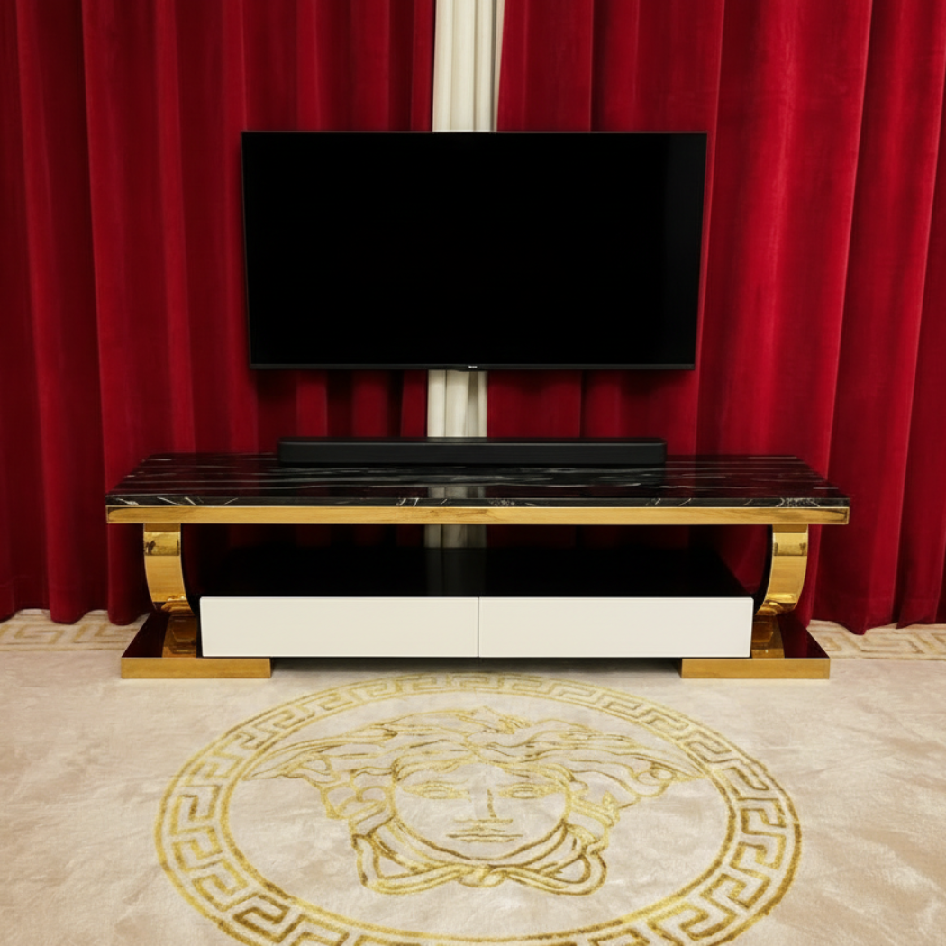 Modern TV stand with a black television against red curtains