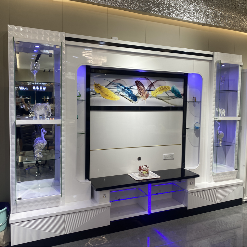 Modern entertainment console with LED lighting in a room.