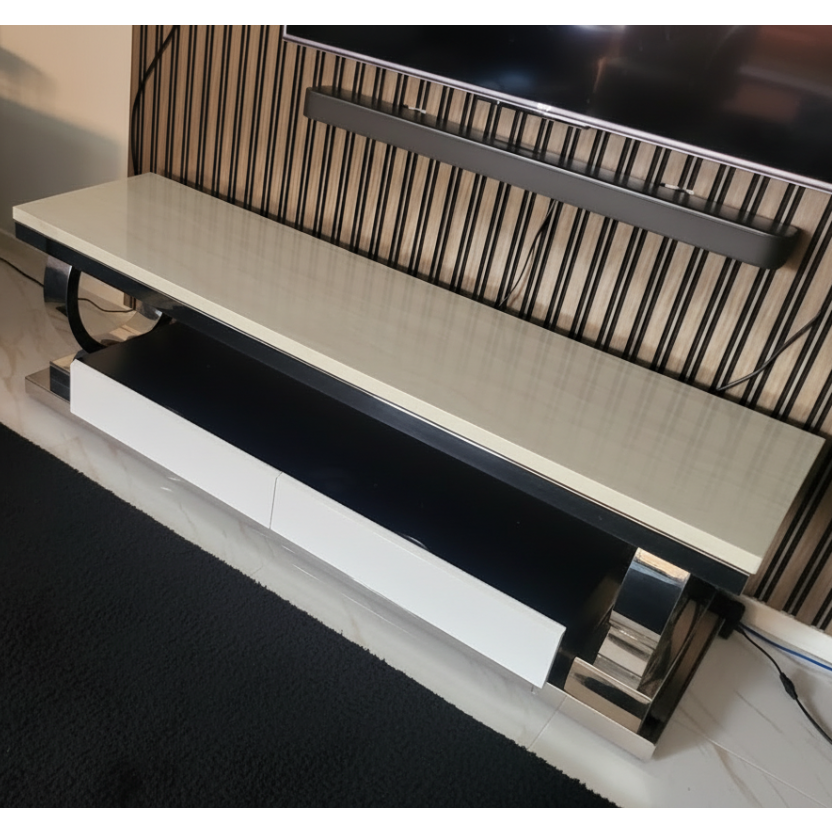 Piano with a bench on a patterned rug