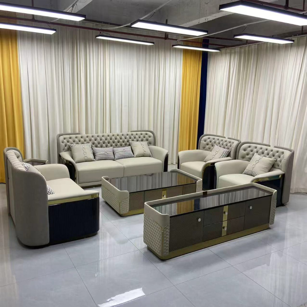 Modern living room setup with gray sofas and a glass coffee table.