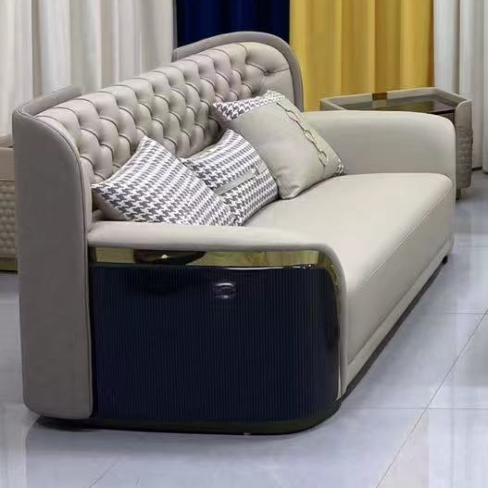 Modern living room setup with gray sofas and a coffee table in a room with striped walls.