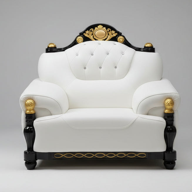 White armchair with gold accents in a room setting