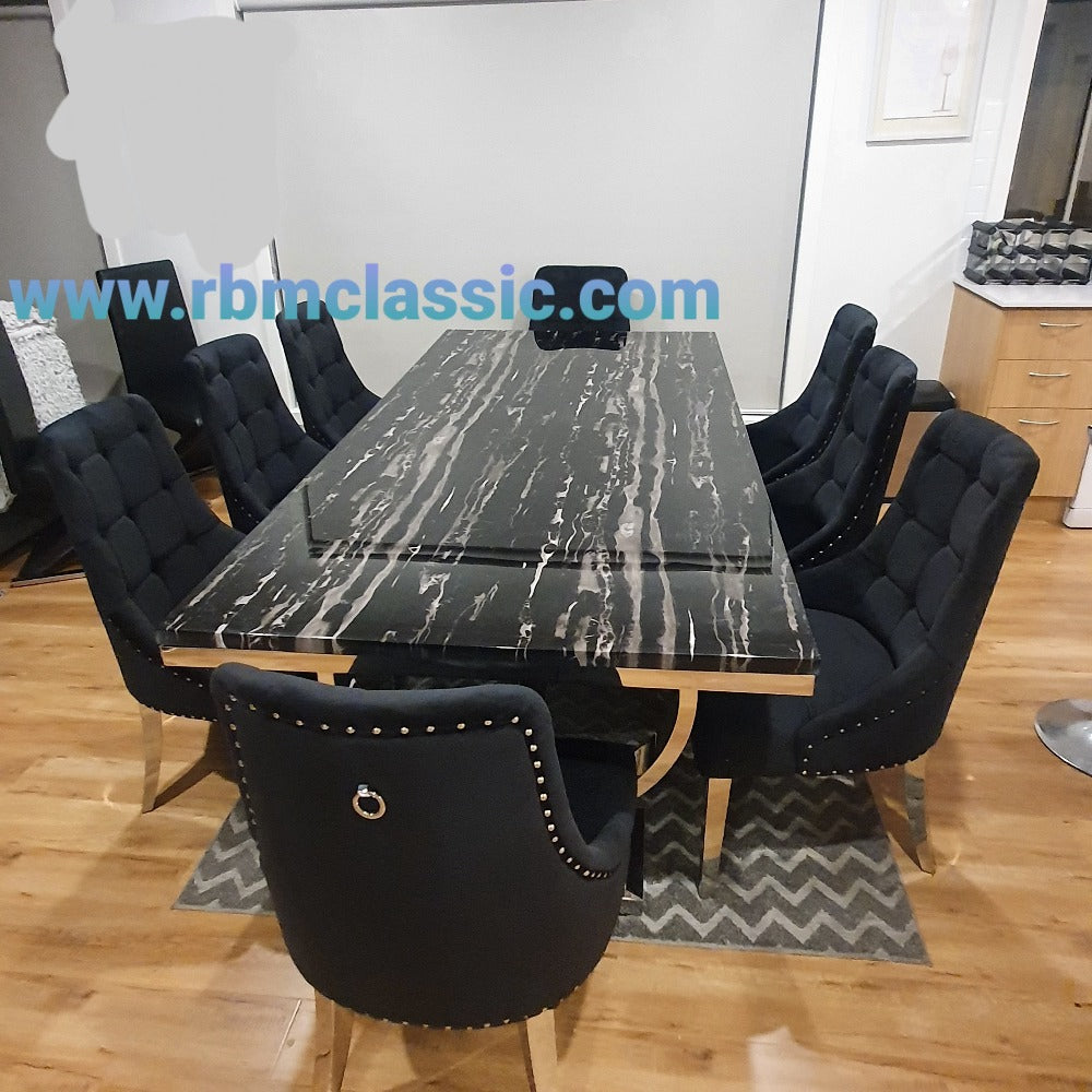 Classy Marble Dining Table With Circle Black Leather Style Dining Room Chairs in Silver Stainless Steel Frame