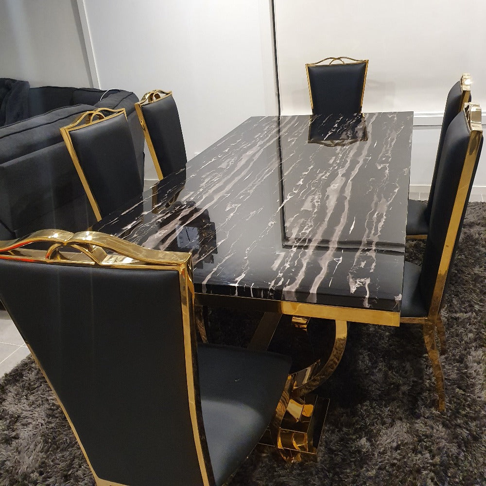 Classic Marble Dining Table With Black Leather Dining Room Chairs in Gold Stainless Steel Frame