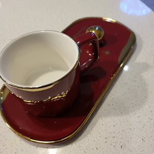Maroon Golden Trim Modern Stars Style Tea Cup and a Saucer