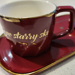 Golden Trim Modern Stars Style Tea Cup, a Saucer and Gold Spoon in maroon