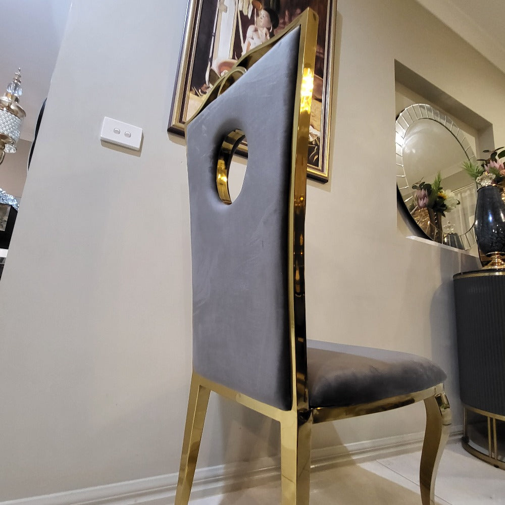 Luxurious and Stylish Elegant Marble Dining table with 6 Circle Grey Velvet Dining Room Chairs in Stainless Steel Frame