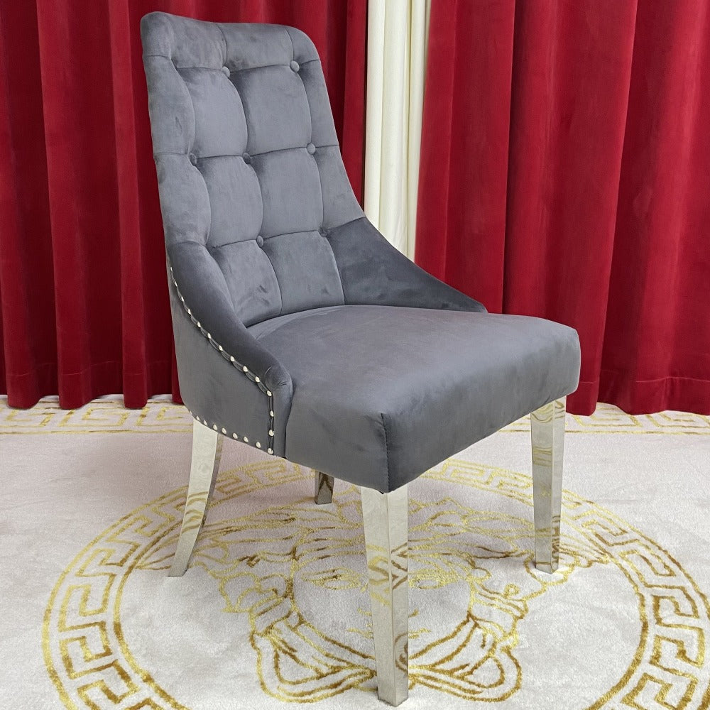 Marble Dining Table With Grey Velvet Dining Room Chairs in Silver Stainless Steel Frame