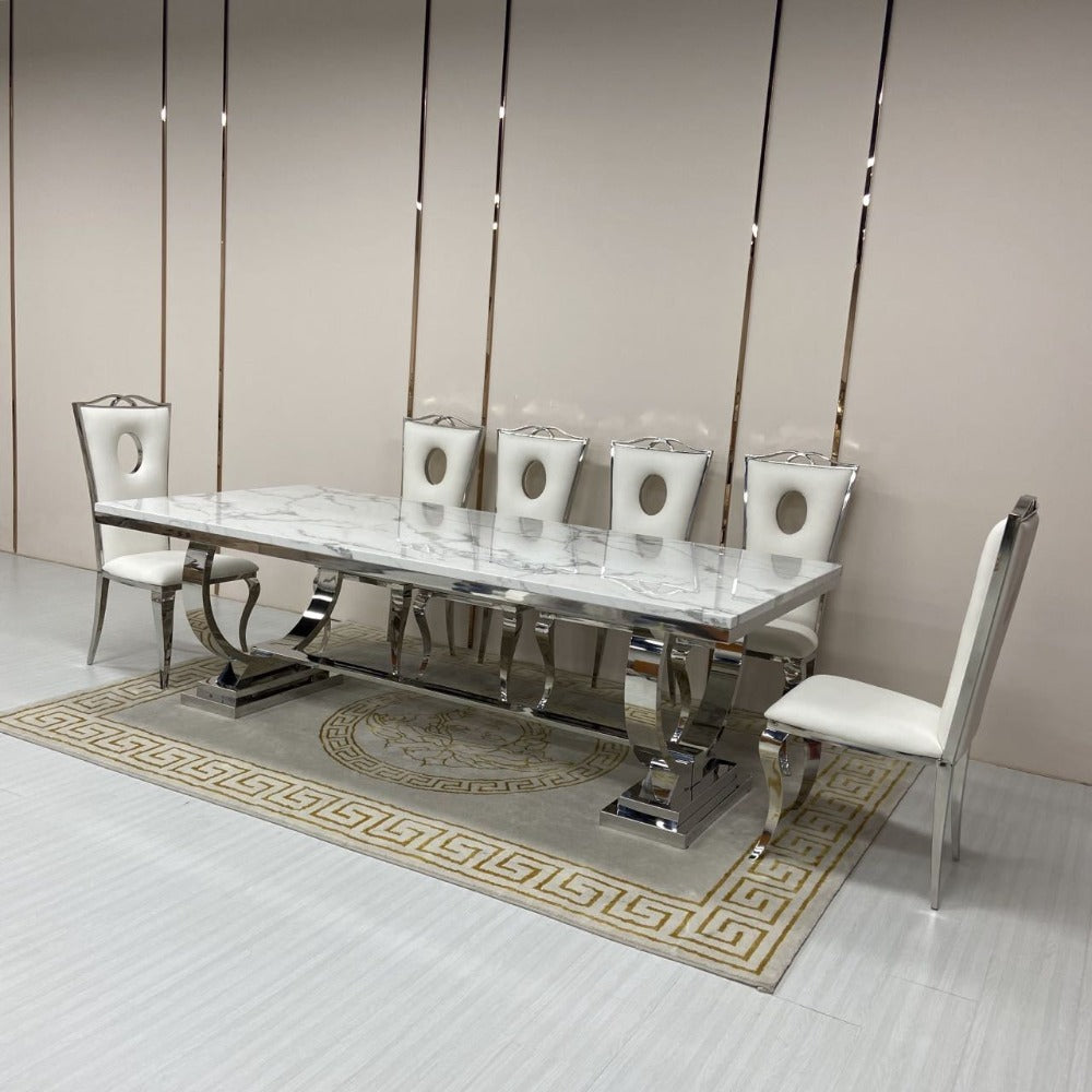 Marble Dining Table With Black Velvet Dining Room Chairs in Silver Stainless Steel Frame