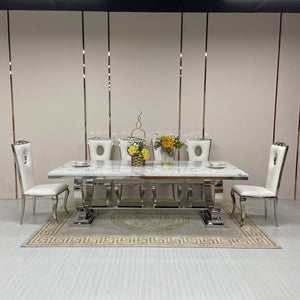 Classy Marble Dining Table With Circle White Leather Dining Room Chairs in Silver Stainless Steel Frame