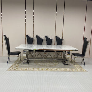 Marble Dining Table With Black Velvet Dining Room Chairs in Silver Stainless Steel Frame