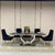 Classy Marble Dining Table with 6 Black Velvet Dining Chairs in Silver Stainless steel frame
