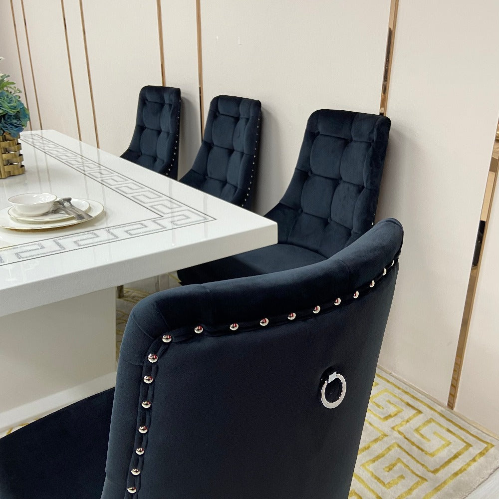 Classy Marble Dining Table With Modern Black  Leather Dining Room Chairs in Silver Stainless Steel Frame