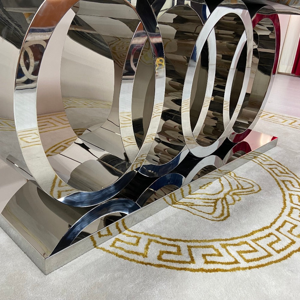 Luxurious and Stylish Elegant and Classy Marble Dining table with 6 Gold Adrian Dining Room Chairs in Silver Stainless Steel Frame
